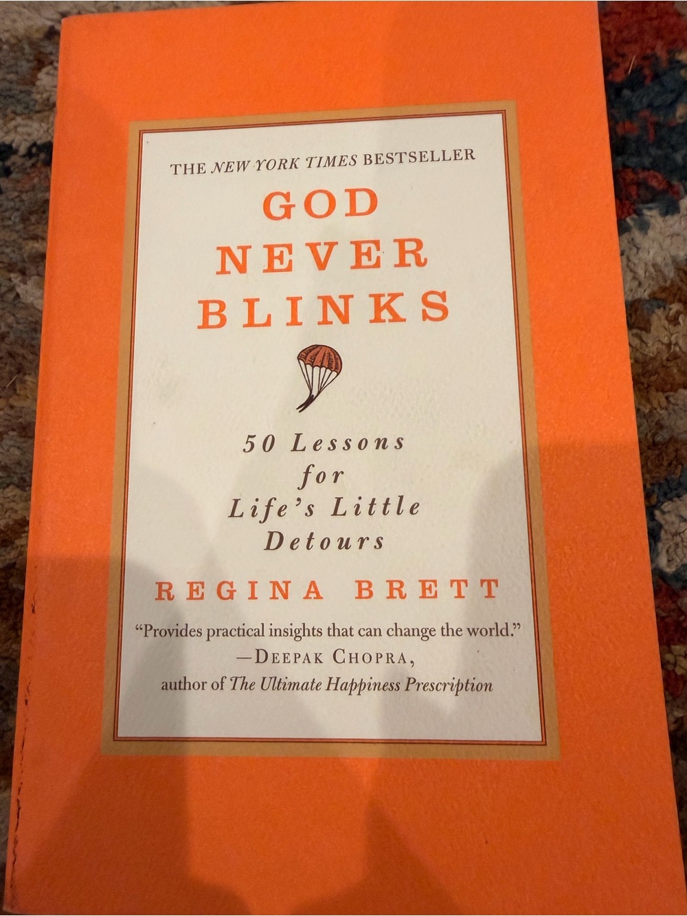 God Never Blinks Paperback Book -
